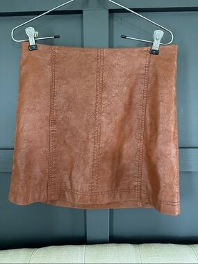 FREE PEOPLE Faux Leather Mini Skirt in Cognac